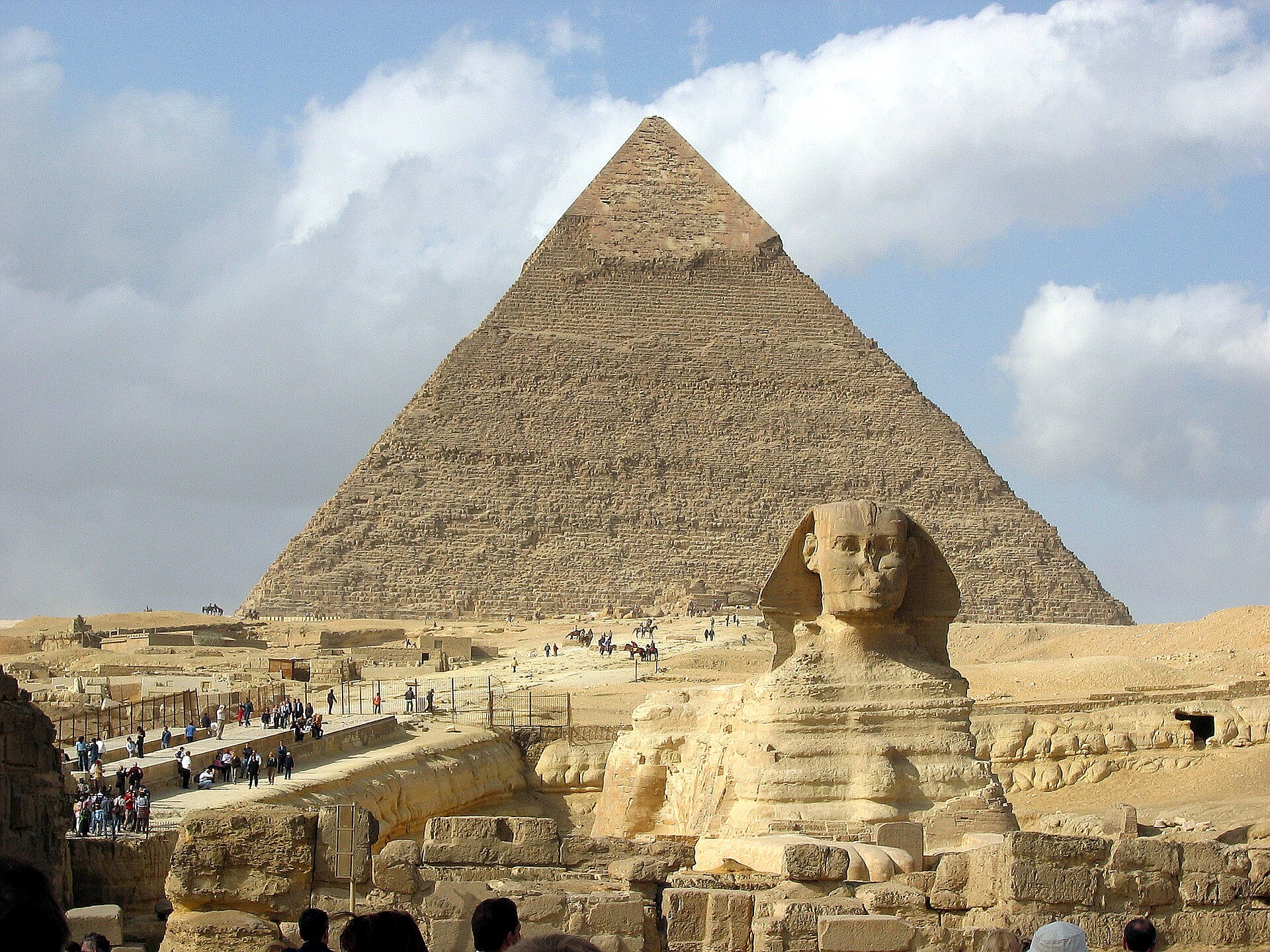 The Great Sphinx with a Pyramid of Giza behind, Egypt